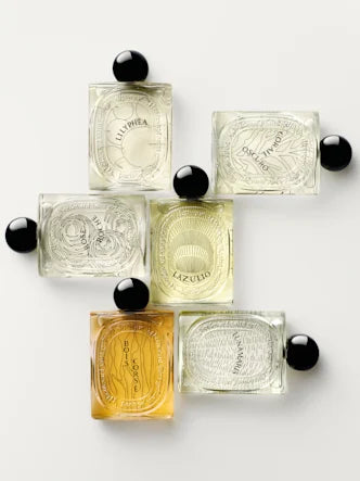 A contemporary bottle embellished with a fresh take on Diptyque’s "Héritage" design.